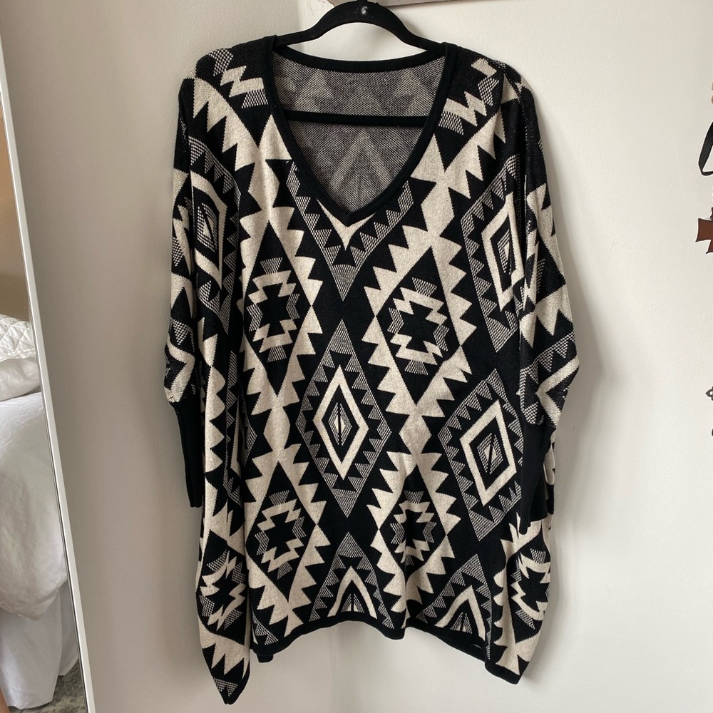 Black and cream patterned sweater
